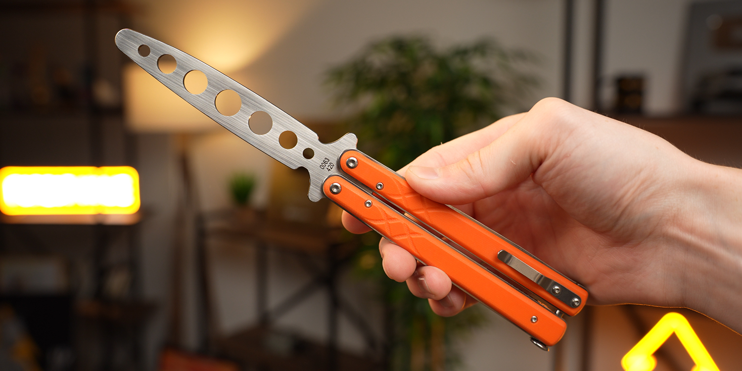 Тренировочный нож Boker Plus Balisong Trainer сталь 420, рукоять Orange G10